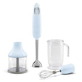 Pastel blue Smeg handheld immersion blender with attachments displayed on a white background