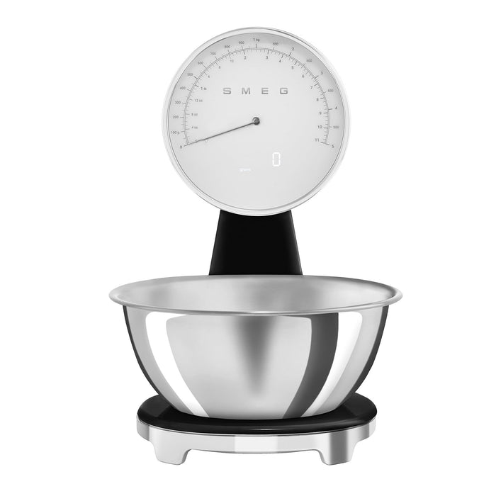 Black, silver Smeg retro style analog digital kitchen scale on a white background
