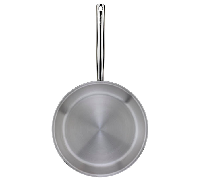 Stainless steel frying pan on a white background