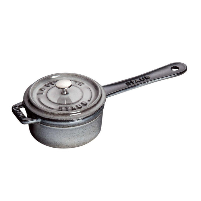 Staub Cast Iron 0.25-qt Mini Saucepan - Graphite Grey displayed on a white background