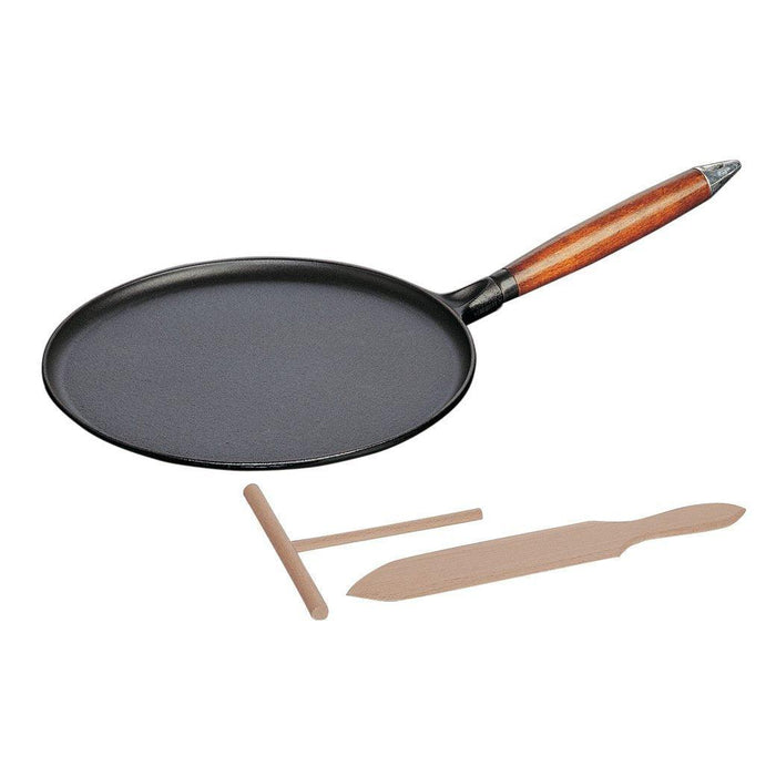 Staub Cast Iron 11″ Crepe Pan with Spreader & Spatula - Matte Black displayed on a white background