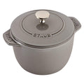 Graphite grey Staub Cast Iron 1.5-qt Petite French Oven displayed on a white background