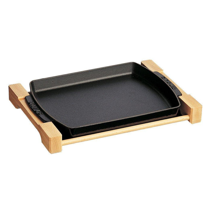 Staub Cast Iron 15″ x 9″ Rectangular Serving Dish with Wood Base - Matte Black displayed on a white background