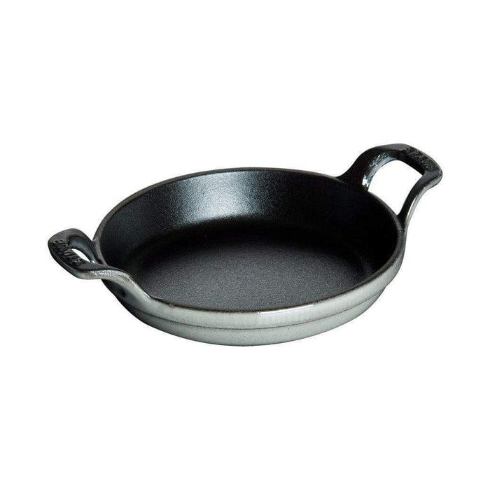 Graphite grey Staub Cast Iron 6″ Round Gratin Baking Dish displayed on a white background