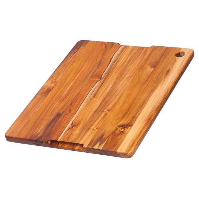 Bottom view of TeakHaus Cutting Boards Proteak Cutting Board with Juice Canal, 18" x 14" x 0.75" displayed on a white background