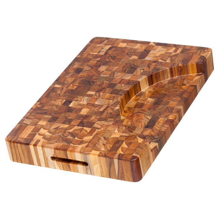 Bottom view of TeakHaus Cutting Boards Proteak End Grain Cutting Board with Hand Grip and Bowl Cut-out, 20" x 14" x 2.5" displayed on a white background