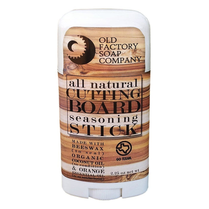 All natural cutting board seasoning stick from Old Factory Soap Company on a white background