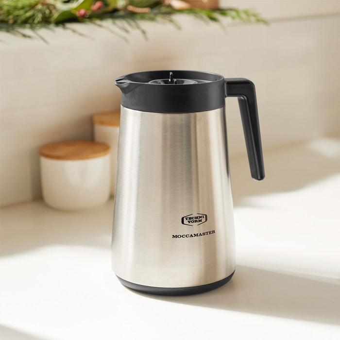 1.25 liter silver Technivorm thermal carafe displayed on a kitchen countertop