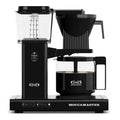 Front view of Black Technivorm Moccamaster KBG 741 Coffee Brewer with coffee filled carafe displayed on a white background