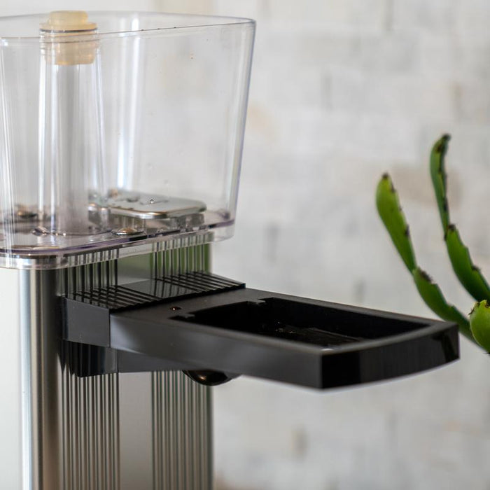 Black Technivorm Moccamaster brew basket bracket attached to appliance