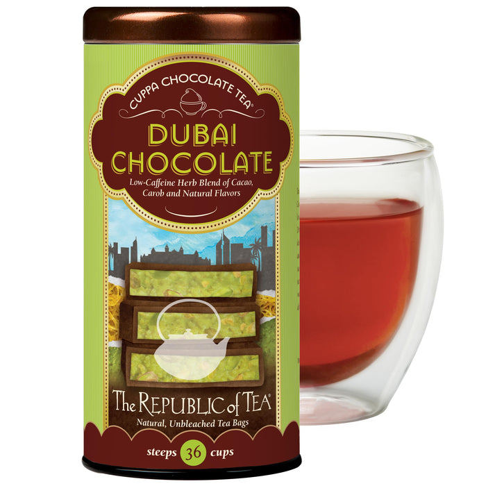 Dubai Chocolate tea canister with a glass of tea on a white background