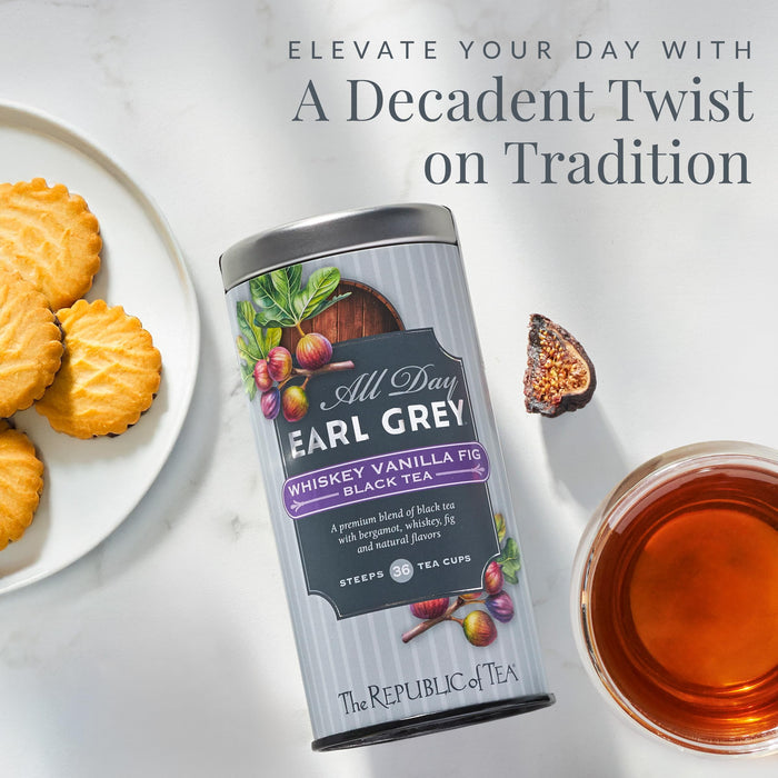 Tea canister with biscuits and tea on a light background
