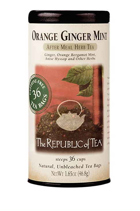 Front view of Tea canister labeled 'Orange Ginger Mint' from 'The Republic of Tea' on a white background