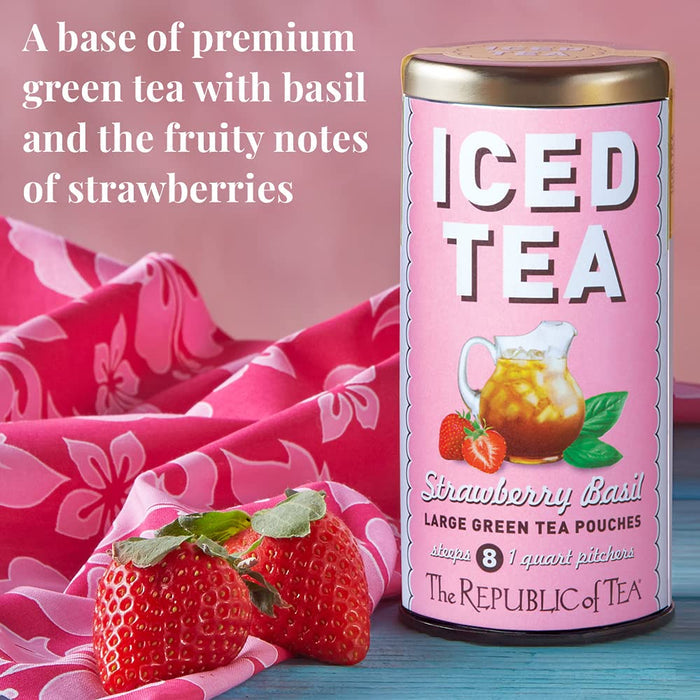 Pink canister of 'Strawberry Basil' iced tea with strawberries on a pink floral cloth background