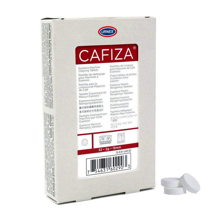 Urnex Cleaning Supplies 32-Pack Urnex Cafiza Espresso Machine Cleaning Tablets next to 3 stacked tablets displayed on a white background