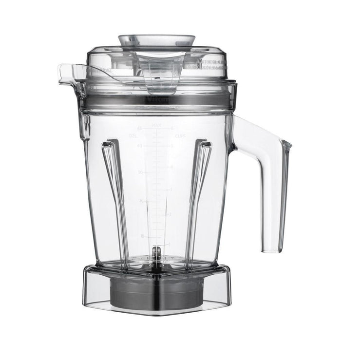Side view of clear Vitamix Aer Disc Aerating Container - 48 oz. with lid displayed on a white background
