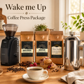 Coffee press package with coffee grinder, coffee bags, and a cup of coffee on a wooden table.