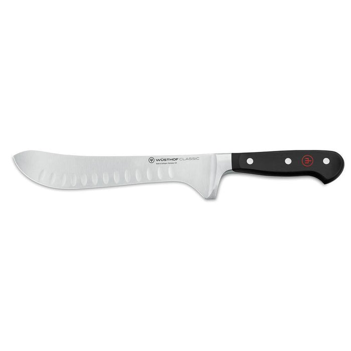 Wusthof Classic Artisan Hollow Edge Butcher Knife - 8″ displayed horizontally on a white background