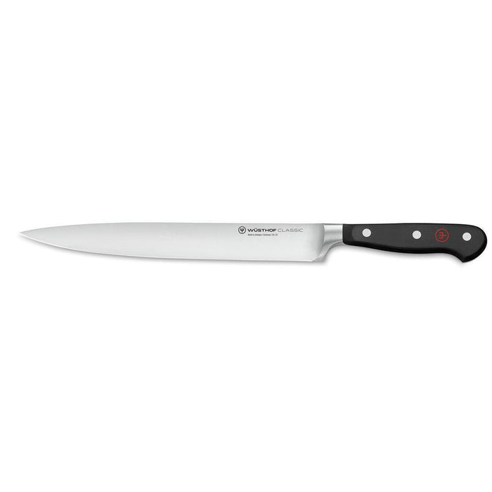 9 inch Wusthof Classic Carving Knife displayed horizontally on a white background