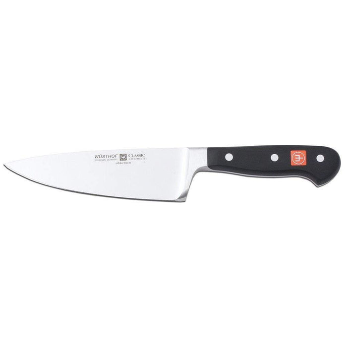 6 inch Wusthof Classic Extra Wide Chef's Knife displayed horizontally on a white background