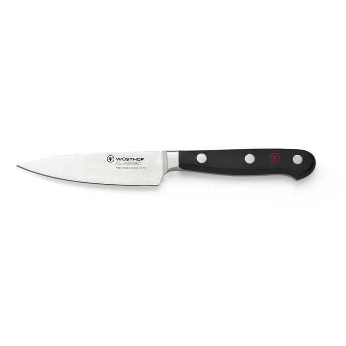 Wusthof Classic Extra Wide Paring Knife - 4″ displayed horizontally on a white background