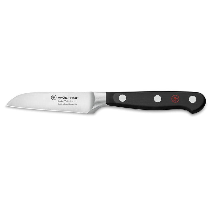 Wusthof Classic Flat Cut Paring Knife - 3″ displayed horizontally on a white background