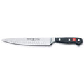 8 inch Wusthof Classic Hollow Edge Carving Knife displayed horizontally on a white background