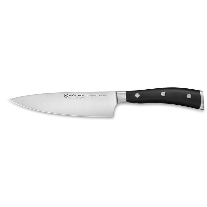 6 inch Wusthof Classic Ikon Chef's Knife displayed horizontally on a white background