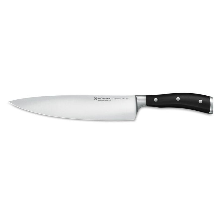 9 inch Wusthof Classic Ikon Chef's Knife displayed horizontally on a white background