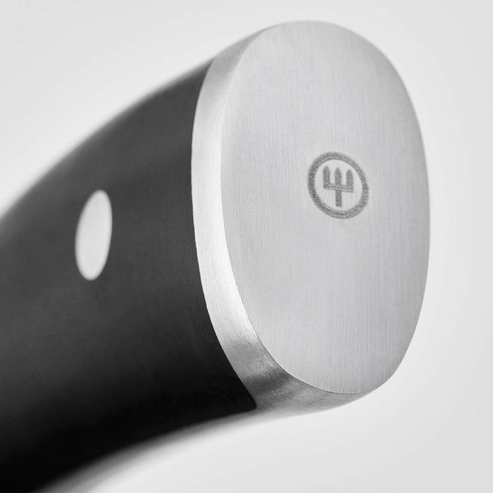 Close up of bottom of the handle of a Wusthof Classic Ikon Curved Peeling Knife (2.75")