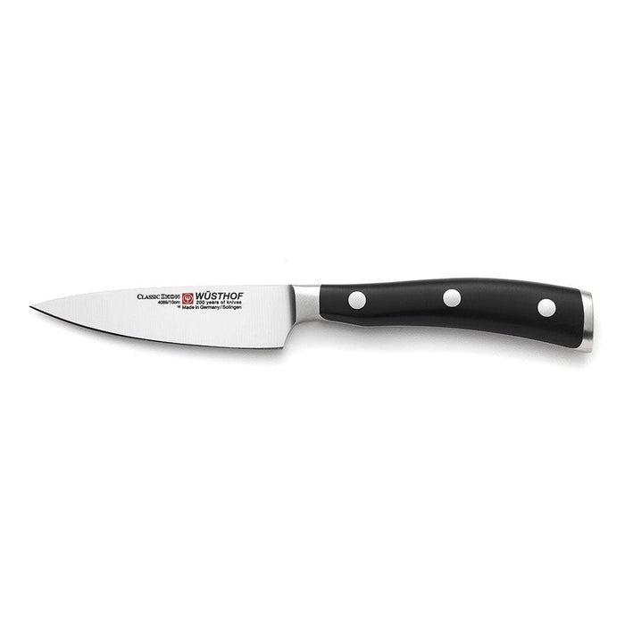 Wusthof Classic Ikon Extra Wide Paring Knife - 4″ displayed horizontally on a white background