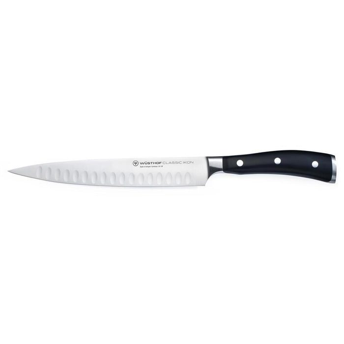 8 inch Wusthof Classic Ikon Hollow Edge Carving Knife displayed horizontally on a white background