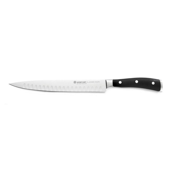 9 inch Wusthof Classic Ikon Hollow Edge Carving Knife displayed horizontally on a white background
