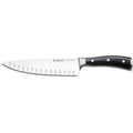 8 inch Wusthof classic ikon hollow edge cook knife displayed horizontally on a white background