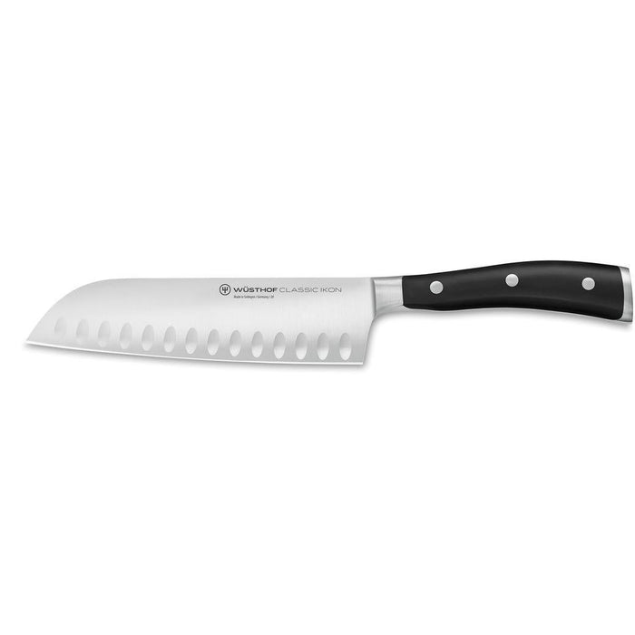 7 inch Wusthof classic ikon santoku knife displayed horizontally on a white background