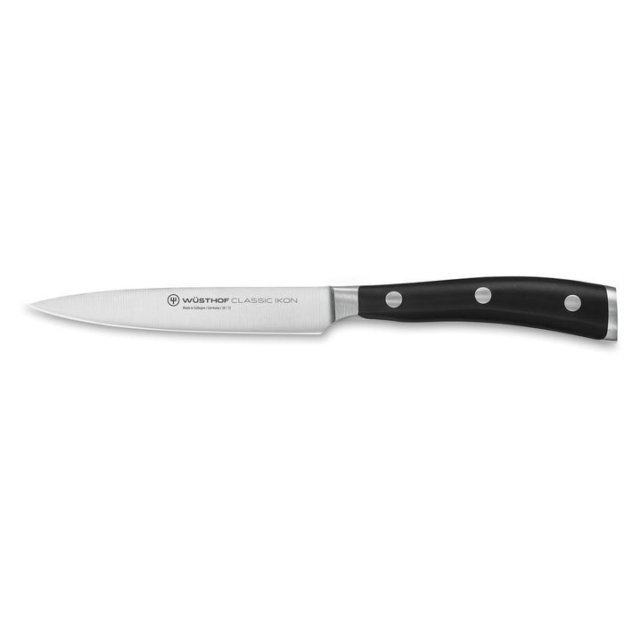 A 4.5 inch Wusthof Classic Ikon Utility Knife with a black handle and a silver-colored blade.