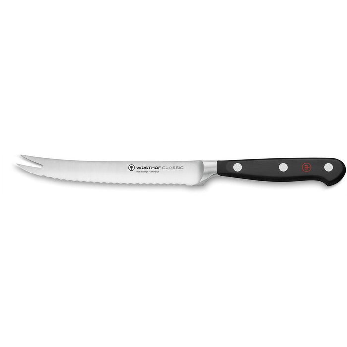 5 inch Wusthof classic tomato knife displayed on a white background
