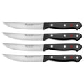 Set of 4 Wusthof steak knives with black handles displayed on a white background