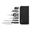 7 piece Wusthof gourmet traveler set with a travel case, 3 knives, shears, corkscrew, and knife sharpener displayed on a white background