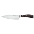 6 inch Wusthof Ikon blackwood chef knife displayed on a white background