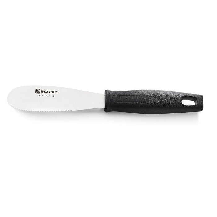 A Wusthof Pro Spreader with a 4-inch stainless steel blade and black poly handle.