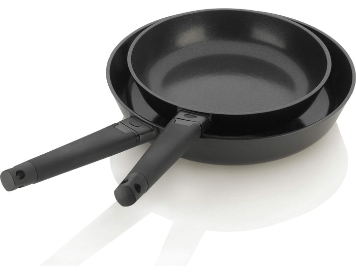 Zavor noir 10 & 12 inch skillet set stacked with black handles on a white background