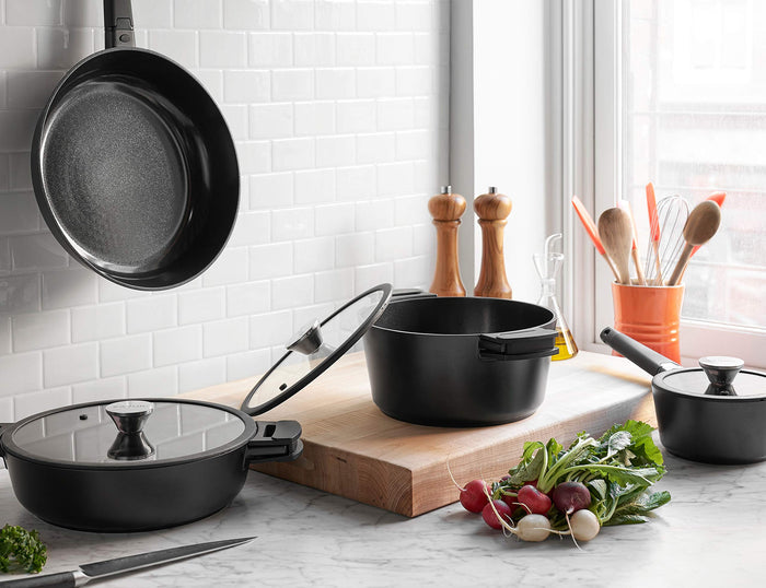 zavor cookware next to cooking material displayed in a kitchen setting
