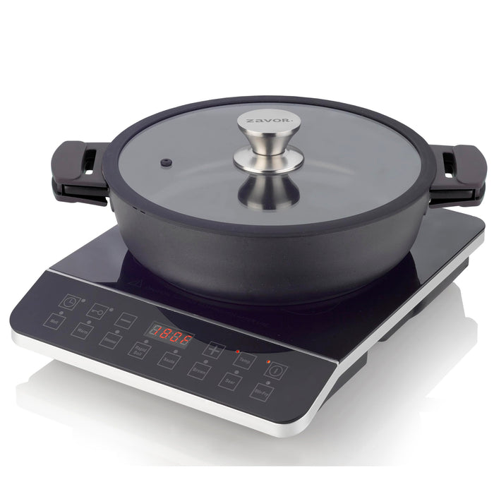 Zavor onyx induction cooktop with a Zavor onyx pot and lid on a white background